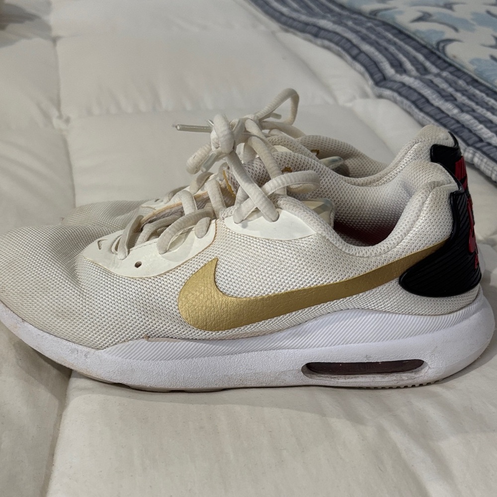 Nike Air White and Gold Athletic Shoes